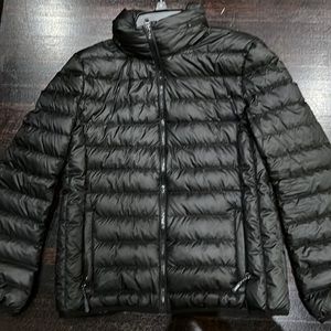 Tumi Pax Preston packable travel puffer jacket.